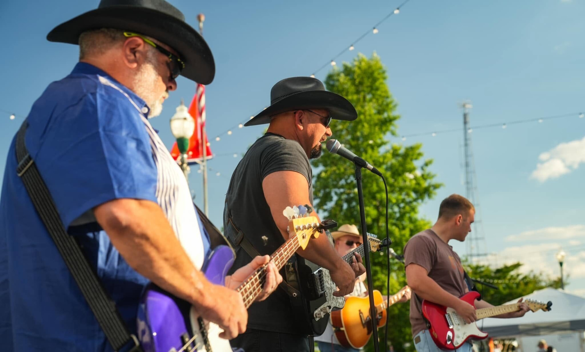 Musicians performing at an outdoor festival in Roane County, Tennessee